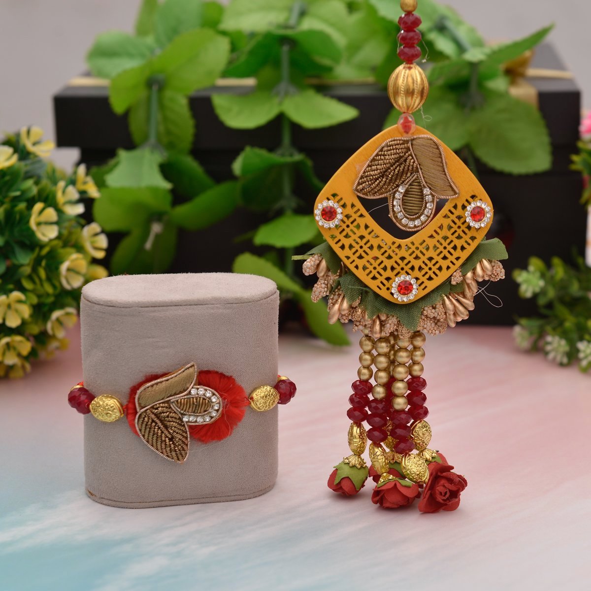 Magnificent Rakhi combo For Brother And Bhabhi